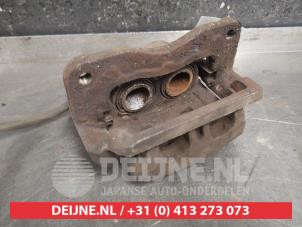 Subaru Impreza Bremszange rechts vorne O462572 foto 2