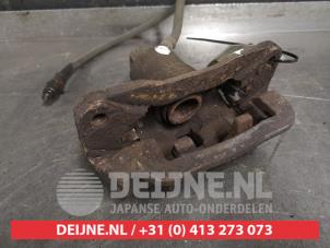 Subaru Impreza Rear brake calliper, left O462573 photo 2