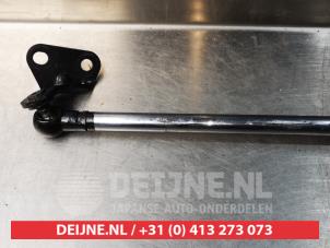 Daihatsu Cuore Gasdemper links-achter O294307 foto 2