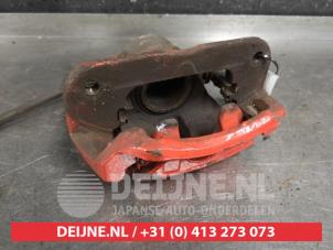 Toyota Avensis Verso Front brake calliper, left O468429 photo 2