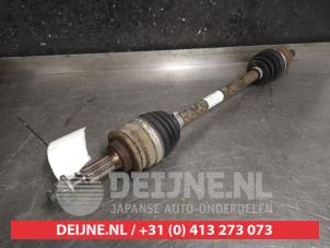 Suzuki Swift Aandrijfas links-voor O468446 foto 2
