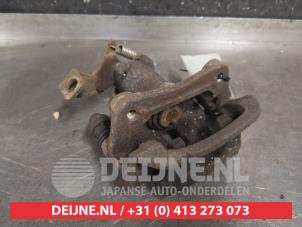 Hyundai Veloster Bremszange links hinten O469643 foto 2