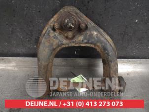 Mitsubishi Pajero Front upper wishbone, left O469761 photo 2