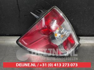 Subaru Forester Rücklicht links O470500 foto 2