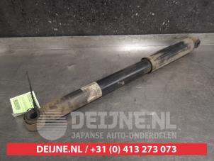 Nissan Navara Schokdemper links-achter O471532 foto 2