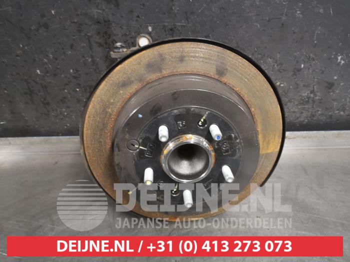 Kia Sportage Fusee links-achter O471859