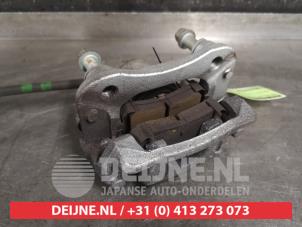 Kia Sportage Bremszange links hinten O471863 foto 2