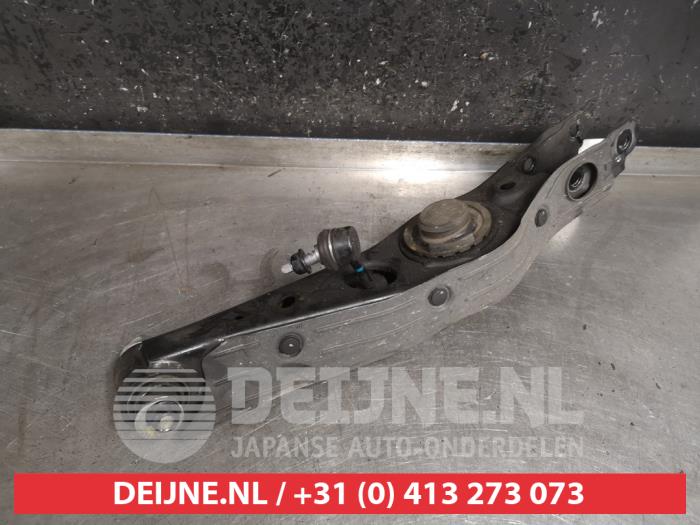 Kia Sportage Draagarm links-achter O471865