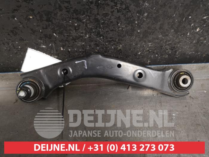 Kia Sportage Draagarm links-achter O471873