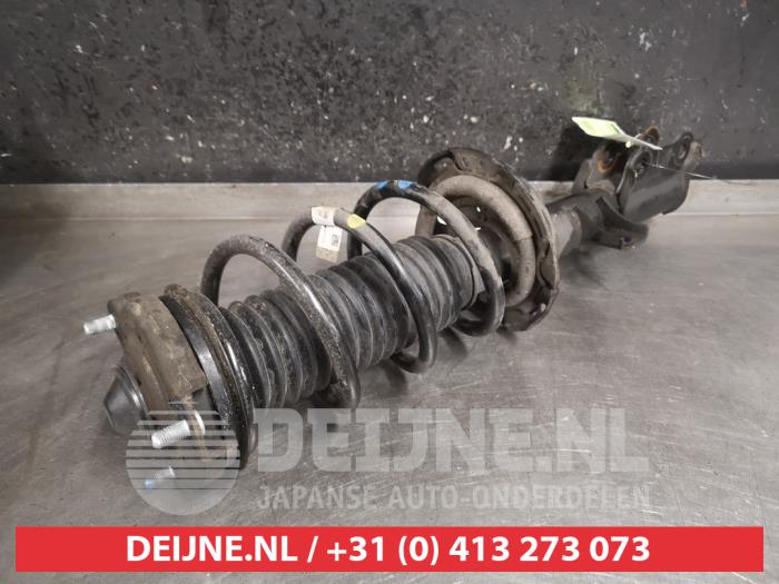 Kia Sportage Schokdemperpoot links-voor O471935