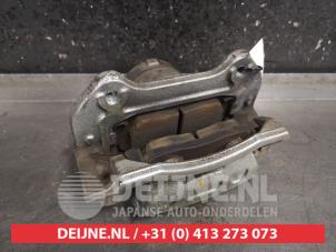 Hyundai Kona Bremszange links vorne O472596 foto 2