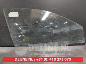 Ssang Yong Korando Türscheibe 4-türig rechts vorne O473633 foto 2
