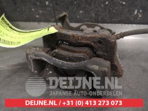 Toyota Auris Bremszange links hinten O473710 foto 2