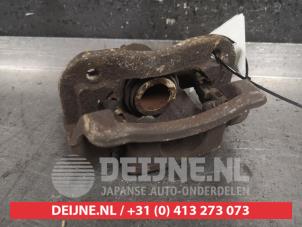 Ssang Yong Korando Rear brake calliper, left O474123 photo 2