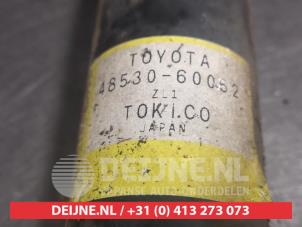 Toyota Landcruiser Schokdemper links-achter O475123 foto 3