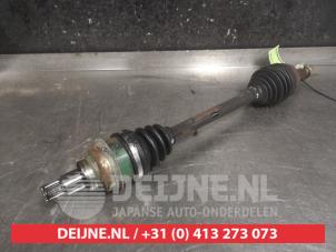 Daihatsu Cuore Aandrijfas links-voor O476302 foto 3
