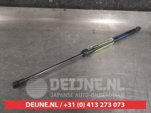 Nissan Micra Gasdemper links-achter O476561 foto 2