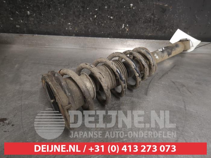 Nissan Primera Rear shock absorber rod, left O476866