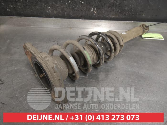 Nissan Primera Rear shock absorber rod, right O476867