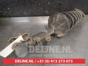 Hyundai Coupe Stoßdämpferstrebe links hinten O477322 foto 2