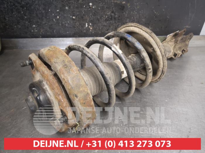 Hyundai Coupe Schokdemperpoot rechts-voor O477328
