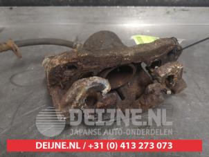 Daihatsu Charade Bremszange links vorne O478645 foto 2