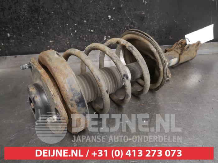 Hyundai Coupe Schokdemperpoot links-voor O479139