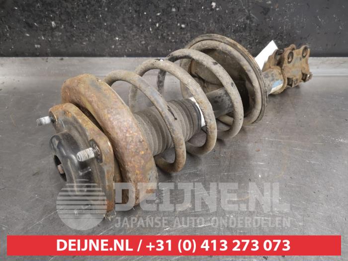 Hyundai Coupe Schokdemperpoot rechts-voor O479140