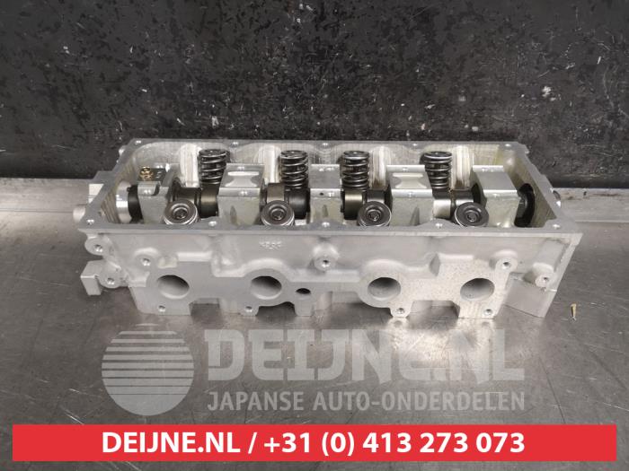 Cilinderkop van een Kia Shuma 1.5i 16V 2002
