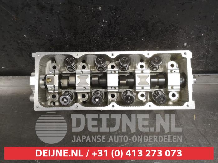 Cilinderkop van een Kia Shuma 1.5i 16V 2002