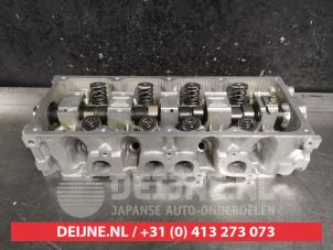 Nieuwe Cilinderkop Kia Shuma 1.5i 16V Prijs € 90,75 Inclusief btw aangeboden door V.Deijne Jap.Auto-onderdelen BV