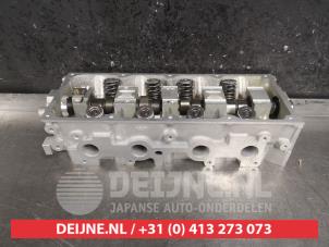 Cilinderkop van een Kia Shuma 1.5i 16V 2002