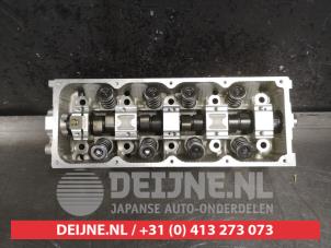 Cilinderkop van een Kia Shuma 1.5i 16V 2002