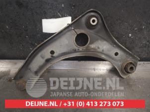 Nissan Note Front lower wishbone, right O479920 photo 2