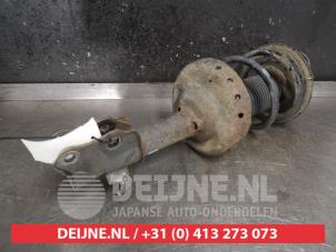 Subaru Impreza Schokdemperpoot links-voor O482354 foto 2