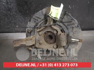 Subaru Impreza Achsschenkel links vorne O482355 foto 2