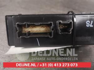 Nissan Micra Multi-functional window switch O485323 photo 2