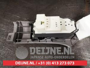 Toyota Yaris Multi-functional window switch O486640 photo 2