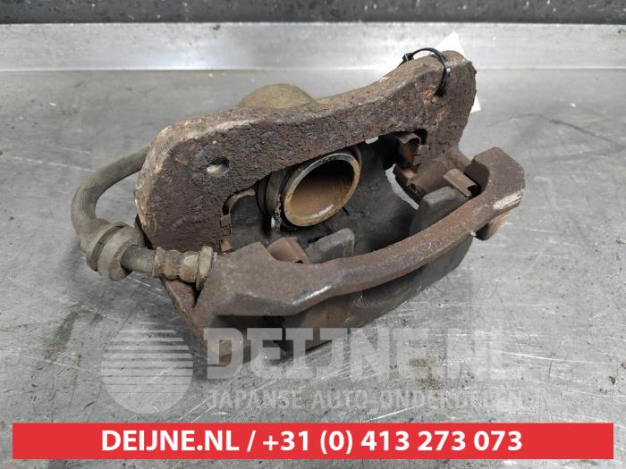 Kia Carens Remklauw (Tang) links-voor O487251