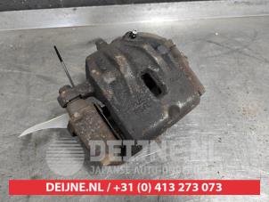 Kia Carens Bremszange links vorne O487251 foto 2