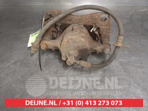 Toyota Corolla Bremszange links vorne O487263 foto 2