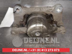 Toyota Corolla Bremszange links vorne O488477 foto 2