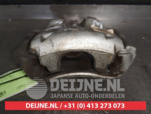 Toyota Corolla Bremszange links vorne O488477 foto 3