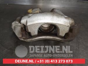 Toyota Corolla Bremszange rechts vorne O488478 foto 3
