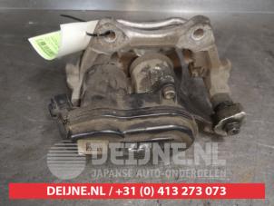 Toyota Corolla Bremszange links hinten O488480 foto 2