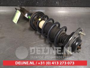 Mitsubishi Colt Stoßdämpferstrebe links vorne O488493 foto 2