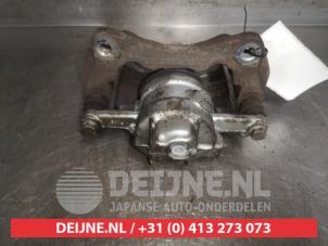 Mitsubishi Colt Bremszange links vorne O488560 foto 2
