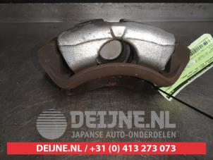 Mitsubishi Colt Bremszange links vorne O488560 foto 3