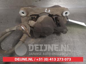 Subaru Forester Bremszange links hinten O489456 foto 2