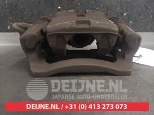 Subaru Forester Bremszange links hinten O489456 foto 3